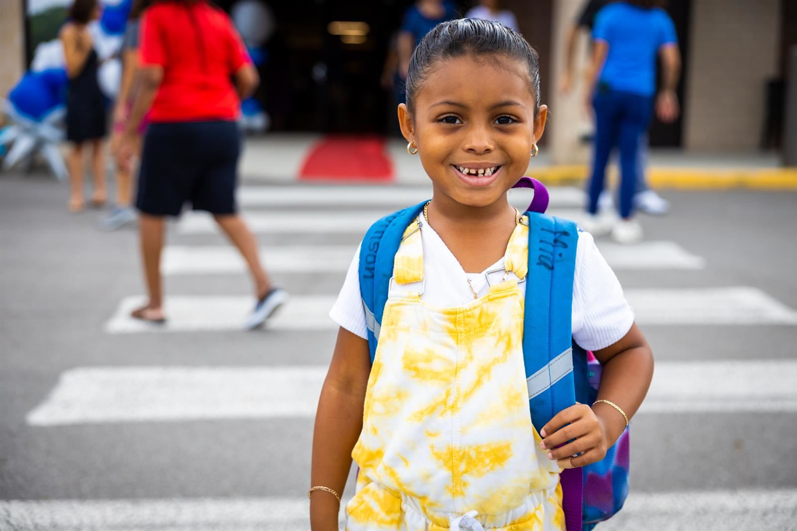 Student smiling on first day of school